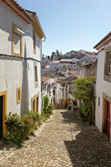 Sidewalk Prints: Cobbled street in Judiara the former Jewish part of Castelo de Vide