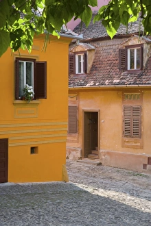 Images Dated 3rd October 2006: Cobbled streets lined with colourfully painted 16th century burgher houses in the medieval citadel