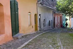 Romanian Prints: Cobbled streets lined with colourfully painted 16th century burgher houses in the medieval citadel