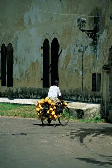 Sinelese Prints: Coconut seller riding his bicycle