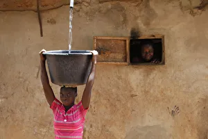 Portrait Prints: Collecting water in a Zou province village, Benin, West Africa, Africa