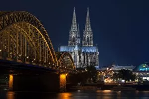 Images Dated 23rd September 2010: Cologne cathedral, UNESCO World Heritage Site, and Hohenzollern bridge at dusk, Cologne, Germany