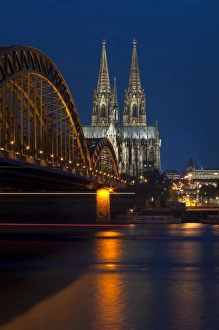 Cologne cathedral, UNESCO World Heritage Site, and Hohenzollern bridge at dusk, Cologne, Germany, Europe