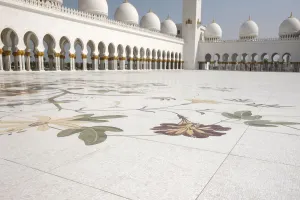 Floral Pattern Prints: Colored floral marble and mosaics used as paving in the courtyard of 17, 000 square metres