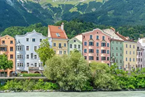 Innsbruck Prints: Colorful buildings line the banks of River Inn on a summer day in Innsbruck