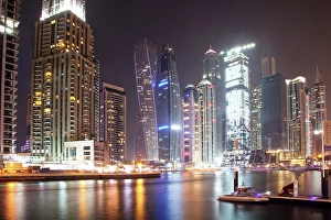 Restaurants Prints: Colorful evening on canal and promenade in Dubai Marina, Dubai, United Arab Emirates