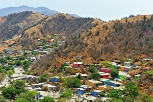 Local Architecture Prints: Colorful houses in a poor area on the hillside around Santa Marta