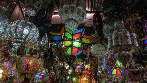 Stalls Prints: Colorful lanterns hang in the Souk of Marrakech during a busy market day in Morocco