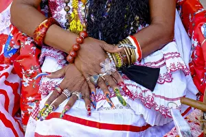 Human Hand Prints: Colorful nails on the crossed hands of a lady in traditional dress, Old Havana, Cuba
