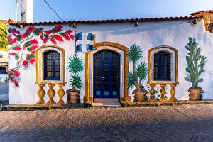 Expressions Prints: Colorful painting on a building in Chersonisos village highlights local art in Crete