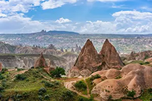 Cappadocia Prints: Colorful rock formations and valleys view with Ortahisar city in the background in Cappadocia