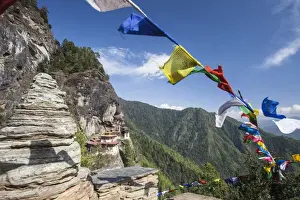 Cloth Prints: The colorful Tibetan prayer flags invite the faithful to visit the Taktsang Monastery
