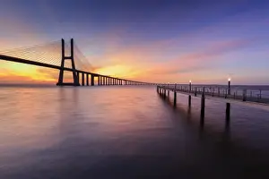 Tagus River Prints: The colors of dawn on Vasco da Gama Bridge that spans the Tagus River, Lisbon, Portugal