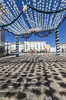 Faro Prints: Colors and decoration in the pedestrian centre of Tavira on a sunny summer day, Faro