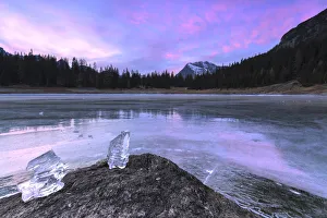 Lombardy Prints: Colors of the sunset reflected on the icy surface of Lake Palu, Malenco Valley, Valtellina