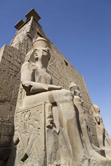 Pylon Prints: Colossus of Ramses II in front of Pylon, Luxor Temple, UNESCO World Heritage Site, Luxor