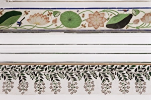 Detail of coloured glass and mirror inlay work found