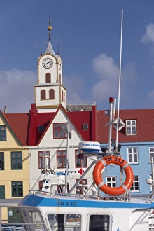 Images Dated 21st September 2008: Colourful boats and picturesque gabled buildings along the quayside in Vestaravag harbour