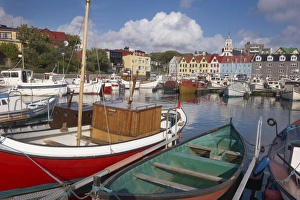 Images Dated 21st September 2008: Colourful boats and picturesque gabled buildings along the quayside in Vestaravag harbour