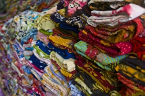 Stacked Prints: Colourful clothes for sale, Nouakchott, Mauritania, Africa