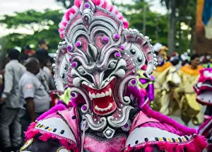 Carnival Prints: Colourful dressed masked man in the Carneval (Carnival) in Santo Domingo