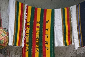 Hanging Prints: Colourful Ethiopian souvenirs for sales in Lalibela, Lalibela, Ethiopia, Africa