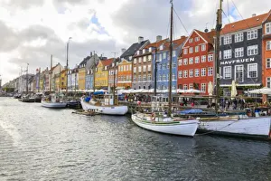 Copenhagen Prints: Colourful facades and typical boats along the canal and entertainment district of Nyhavn