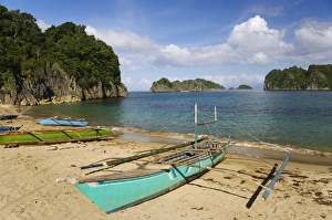 Luzon Prints: Colourful fishing boat on Gota Beach