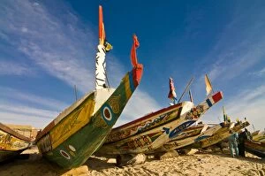 Colourful fis hing boats at the fis hing habour, Nouakchott, Mauritania, Africa