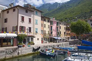 Verona Prints: Colourful harbourside houses in the village of Brenzone on the eastern shore of Lake Garda