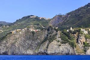 Cinque Terre Prints: Colourful houses and cliffs atop rocky promontory, Corniglia, Cinque Terre, UNESCO