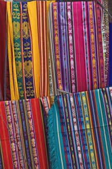 Images Dated 28th January 2005: Colourful indigenous-style textiles on sale in the provincial capital, Riobamba