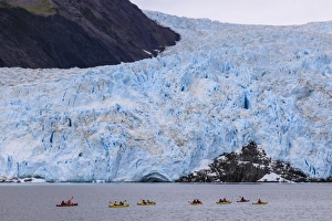 Kayaking Prints: Colourful kayaks, Aialik Glacier, blue ice and mountains, Harding Icefield, Kenai