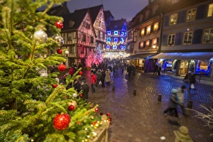 Christmas Tree Prints: Colourful lights on Christmas trees and ornaments at dusk, Colmar, Haut-Rhin department