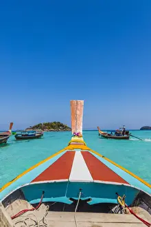 South East Asian Prints: A colourful long tail boat on Ko Lipe Island in Tarutao National Marine Park, Thailand
