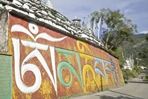 Colourful mani wall with Tibetan inscriptions, Tashiding, Sikkim, India, Asia