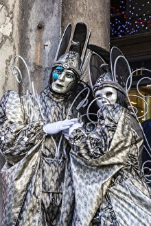 Colourful masks and costumes of the Carnival of Venice, famous festival worldwide