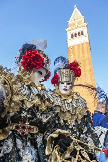 Disguise Prints: Colourful masks and costumes of the Carnival of Venice, famous festival worldwide