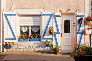 Cottages Prints: A colourful old fishermans house in Saint Vst La Hougue