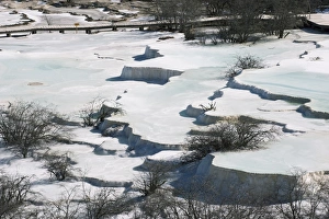 Images Dated 1st December 2008: Colourful pools of calcite deposit frozen at Huanglong National Park, UNESCO World Heritage Site