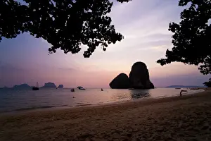 Colourful purple tropical sunset at Ao Phra Nang Beach, Railay (Rai Leh), South Thailand, Southeast Asia, Asia