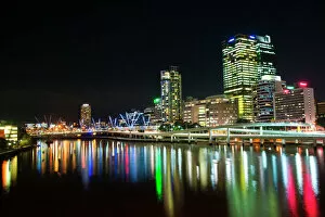 Search Results: Colourful reflection of city skyline in Brisbane River at night, Brisbane, Queensland, Australia