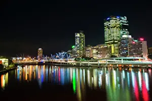 Colourful Prints: Colourful reflection of city skyline in Brisbane River at night