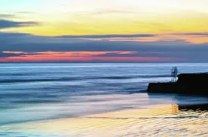 Moment Prints: Colourful sunset over the English Channel as seen from Brighton beach