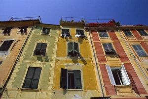 Colourful trompe l oeuil facades by the harbour