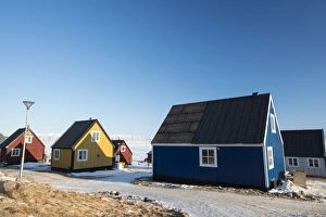 Colourful wooden houses in the village of Qaanaaq, one of the most northerly human