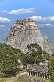 Columns Building in the foreground, and Pyramid of the Magician beyond, Uxmal, Mayan