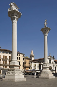 Two columns in the Piazza dei Signori, one bearing the Venice Lion, the other with St