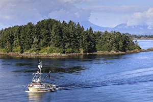 Sitka Prints: Commercial fishing boat and small forested island, rare summer sun, Sitka Sound, Sitka