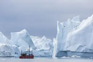 Ilulissat Prints: A commercial iceberg tour amongst huge icebergs calved from the Ilulissat Glacier